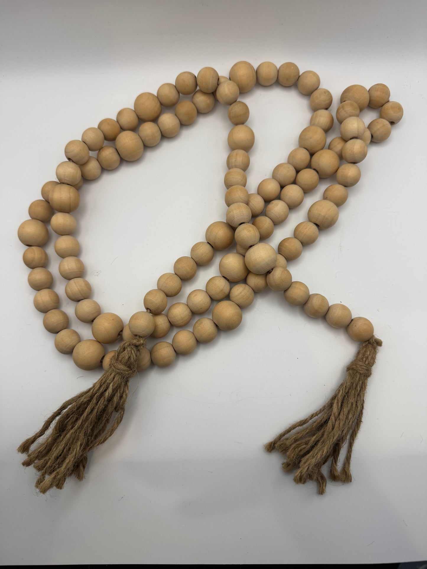 Natural Wood Beaded Garland with Jute Tassels β 70"