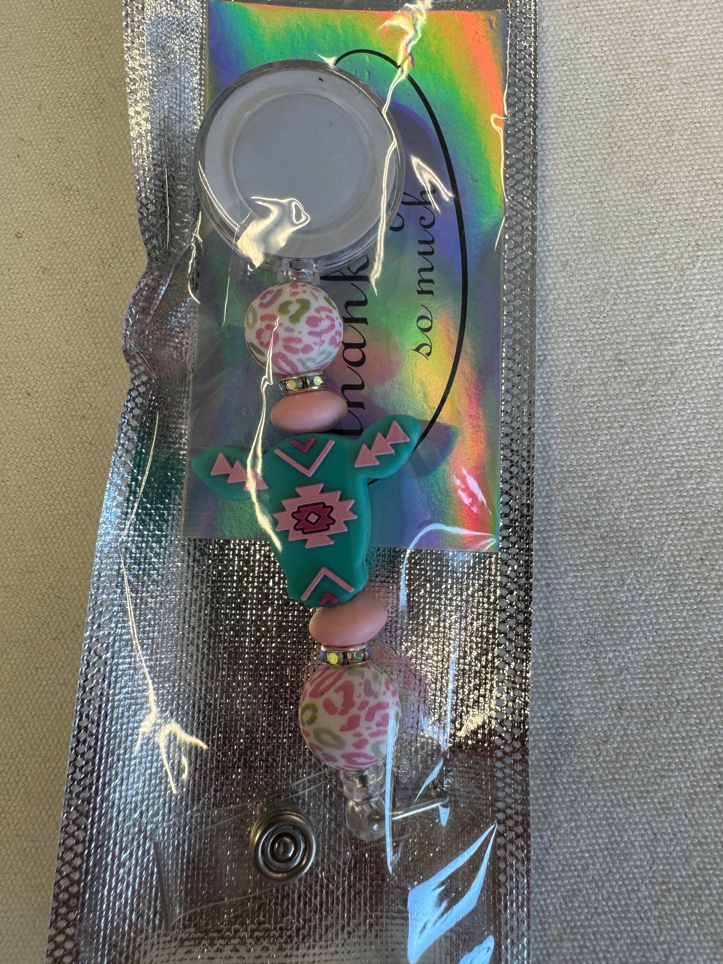 Badge Reel - Teal Cow