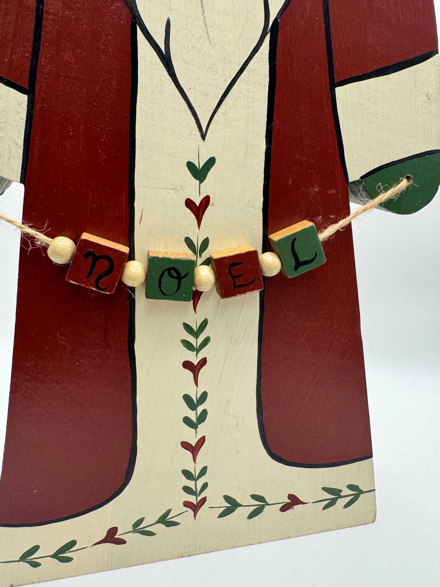 14" Wooden Folk Art Santa Figurine with “NOEL” Garland