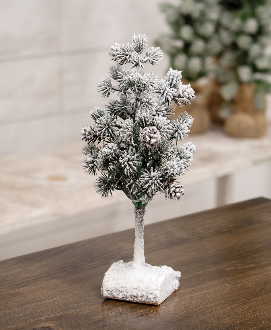 Flocked Bristle Pine Tree with Cones on Log – 9"