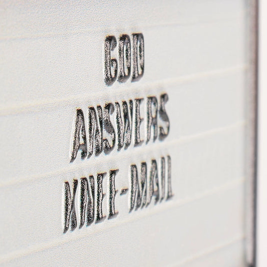 God Answers Knee-Mail Ornament