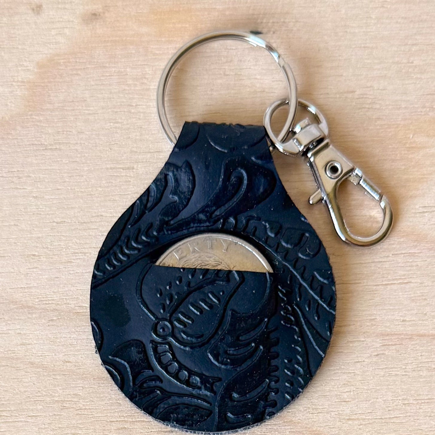 Black embossed quarter keeper (00L0NS)