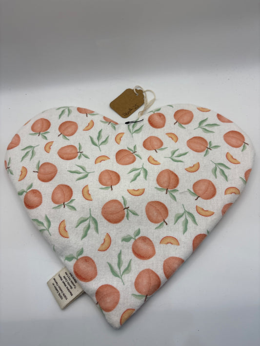 Not visible Accent Pillow - White with orange and green pattern - Heart-shaped