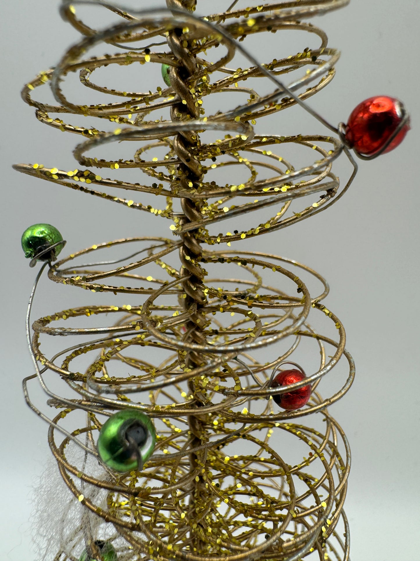 Gold Spiral Wire Christmas Tree with Red & Green Ornaments – 9" Holiday Decor