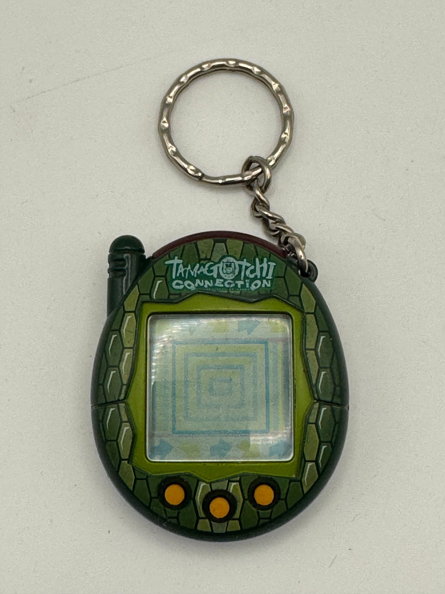 Tamagotchi Connection V3 – Green Reptile (2004)