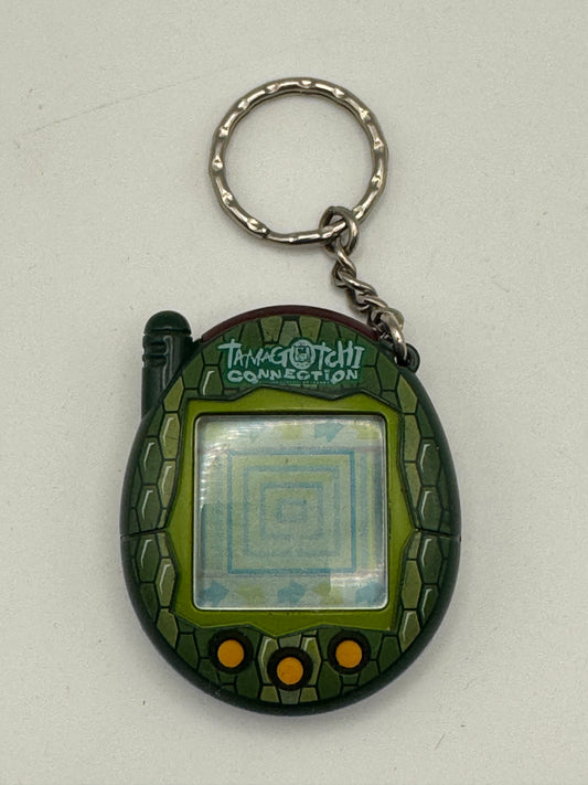 Tamagotchi Connection V3 – Green Reptile (2004)