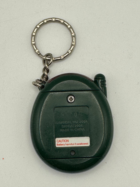 Tamagotchi Connection V3 – Green Reptile (2004)