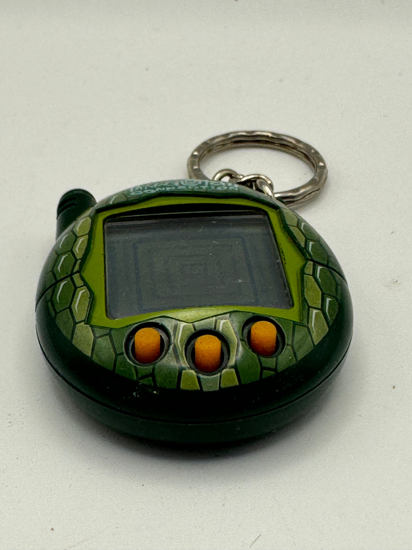 Tamagotchi Connection V3 – Green Reptile (2004)