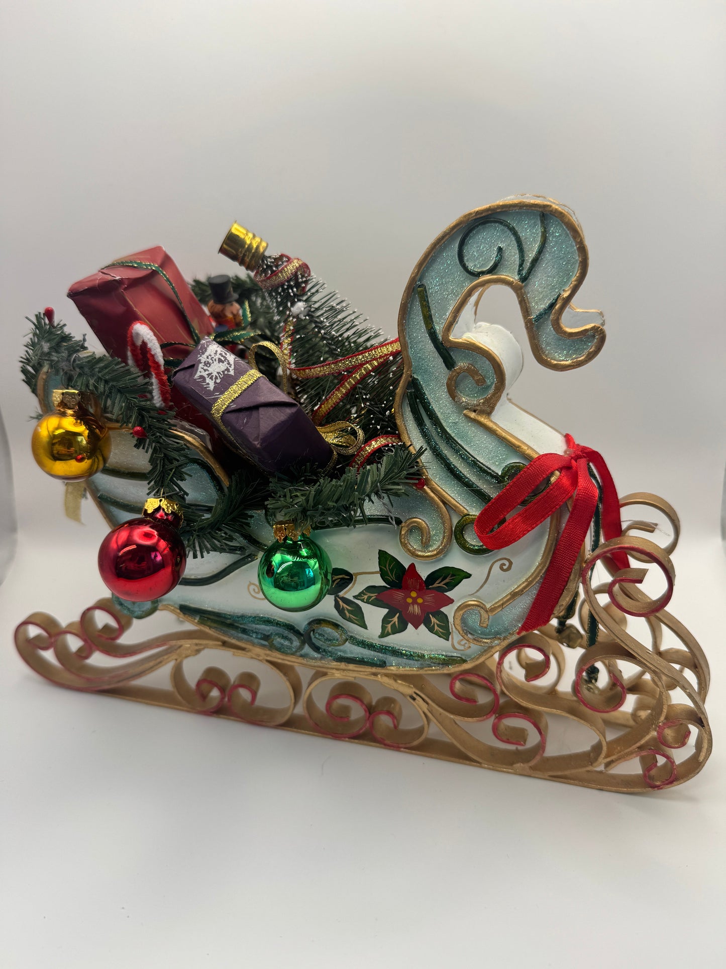 Festive Christmas Sleigh Tabletop Decoration – Blue & Green Glitter Sleigh with Gifts and Tree