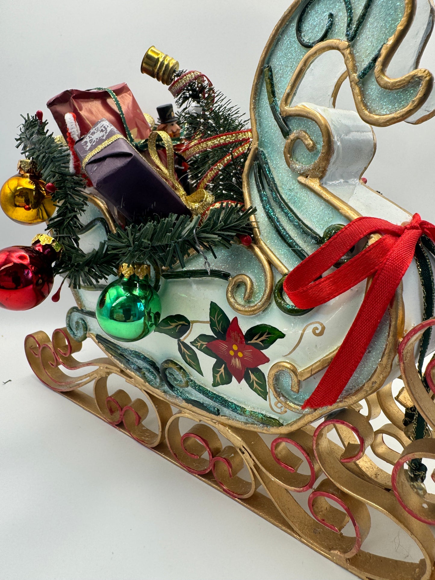 Festive Christmas Sleigh Tabletop Decoration – Blue & Green Glitter Sleigh with Gifts and Tree