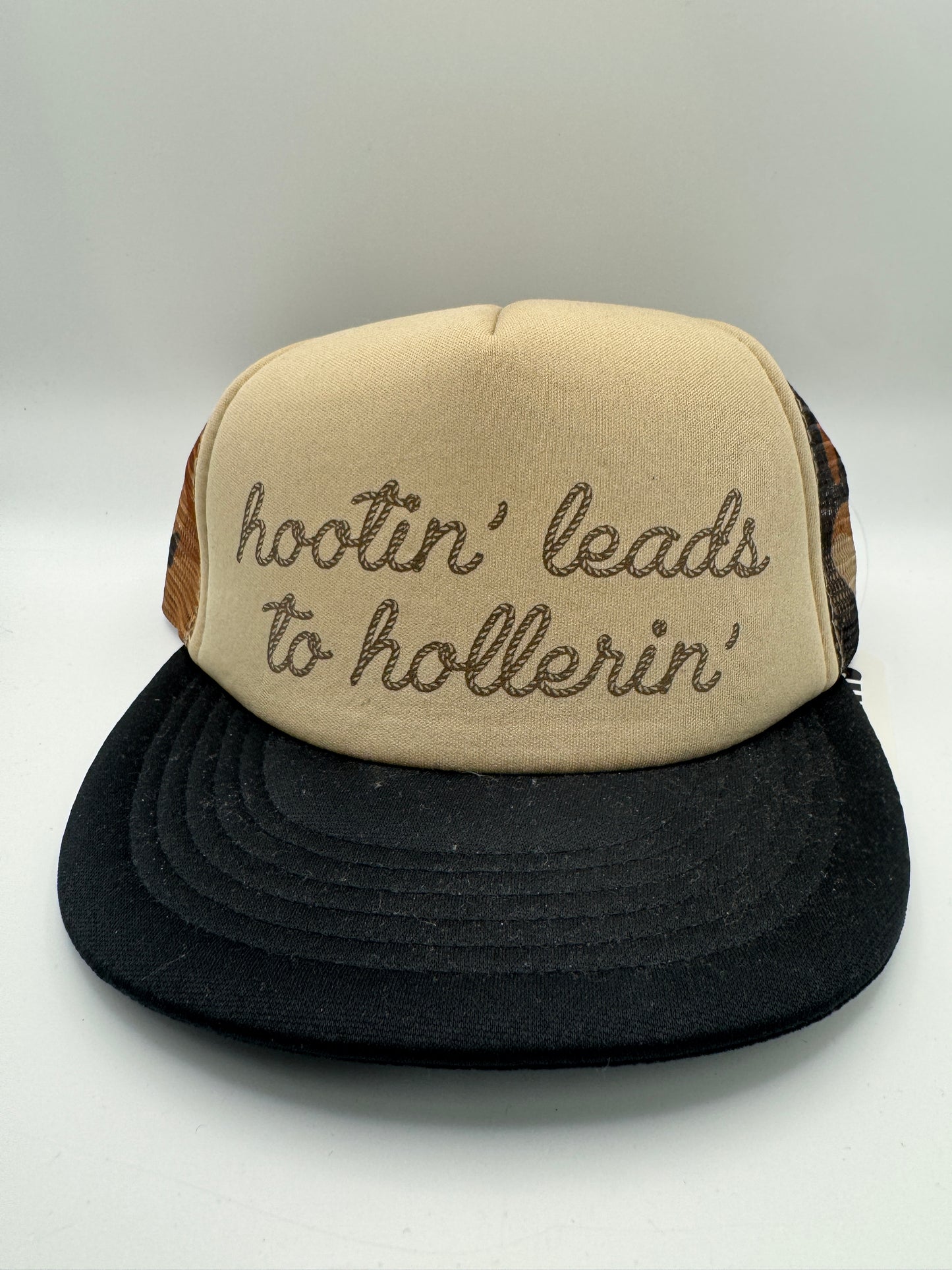 “Hootin’ Leads to Hollerin’” Trucker Hat – One Size